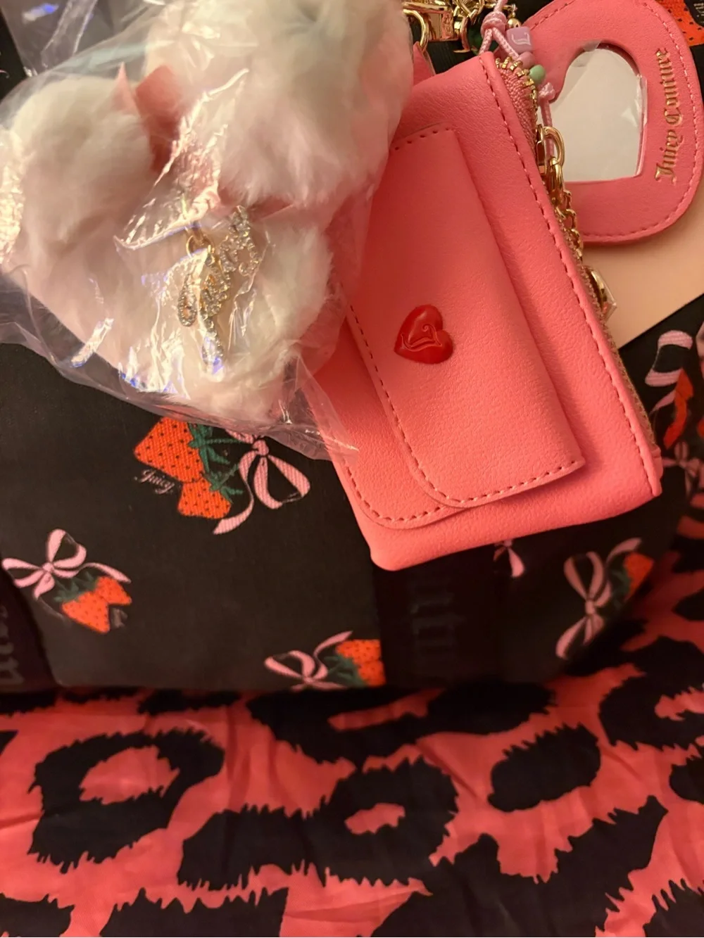 Black juicy couture tote bag with bag charms( super cute for back to school)